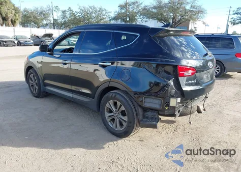 2014 Hyundai Santa Fe Sport 2.4L z USA, uszkodzony, nr VIN 5XYZUDLB7EG209088